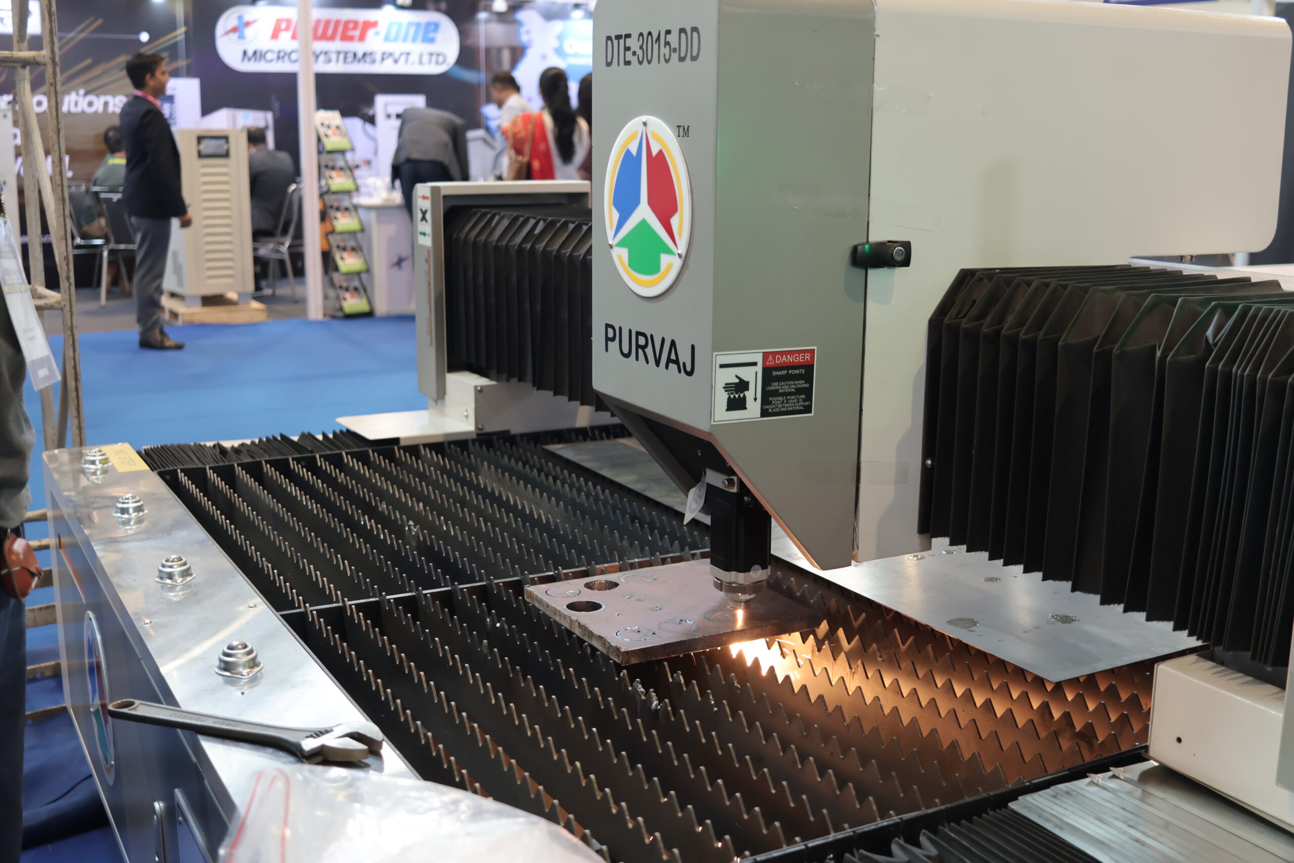 Close-up of industrial laser cutting machine on display