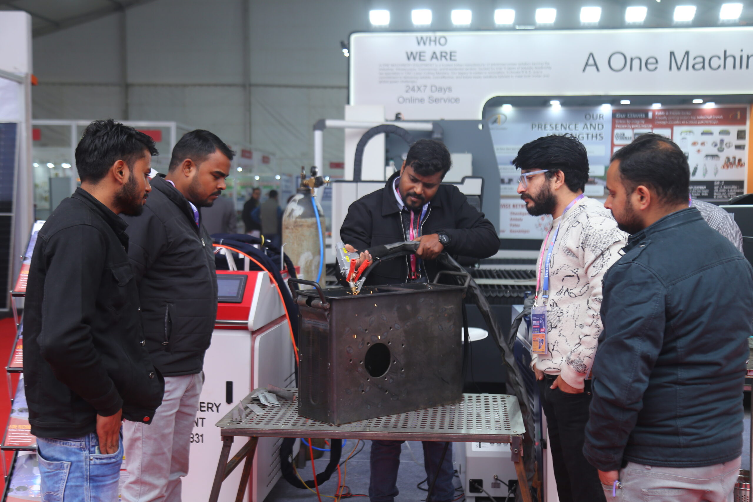 Visitors examining solar panels at Light Lift India stall
