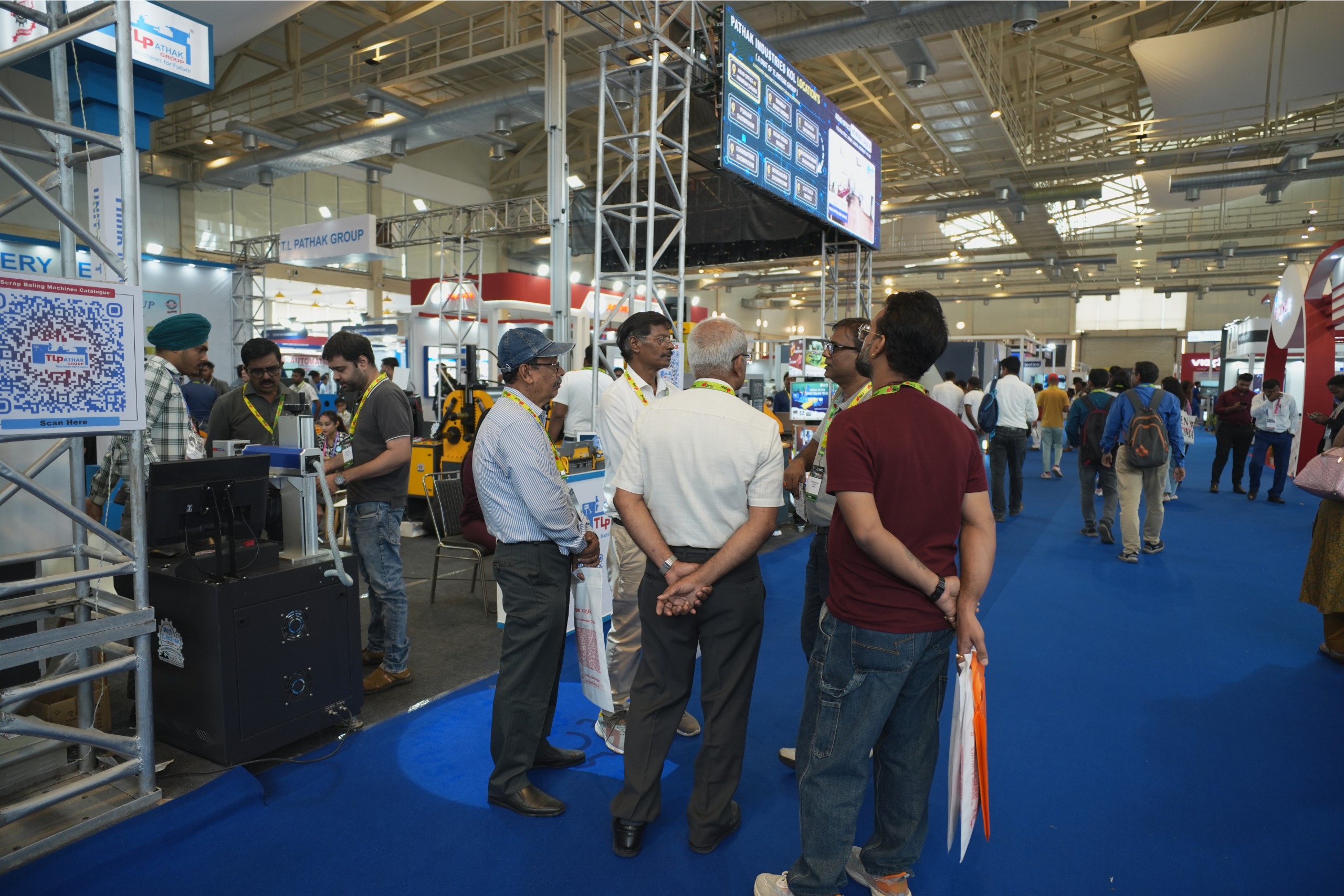 Indoor exhibition hall with visitors on the floor