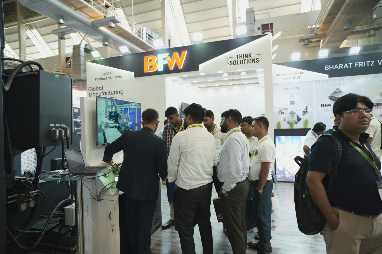 Business handshake deal at exhibition booth